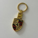 KEYRING- PORSCHE LOGO METAL GOLD